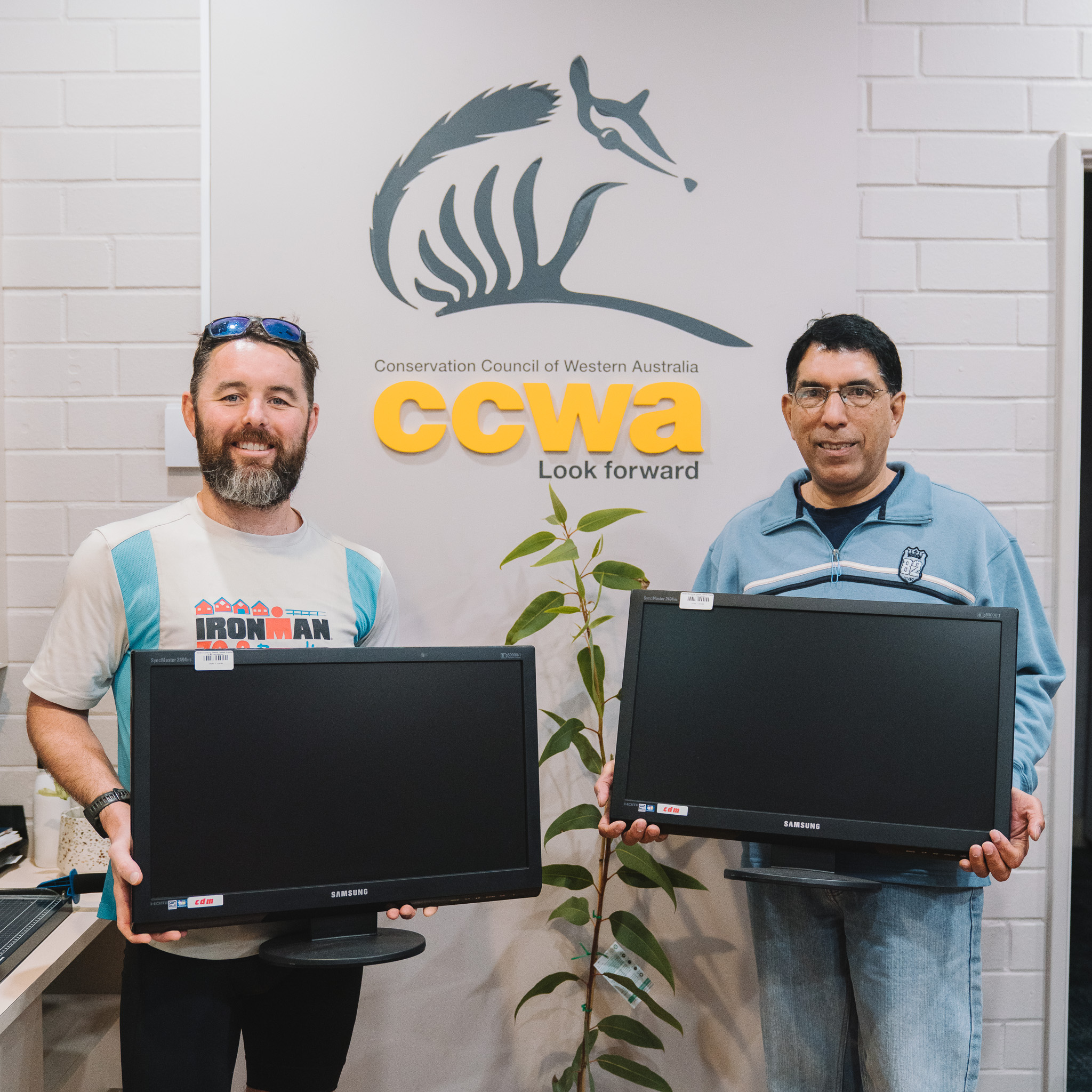 Total Green donates computers to Conservation Council